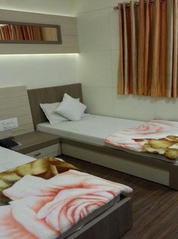 Hotel Oasis Bombaim Quarto foto