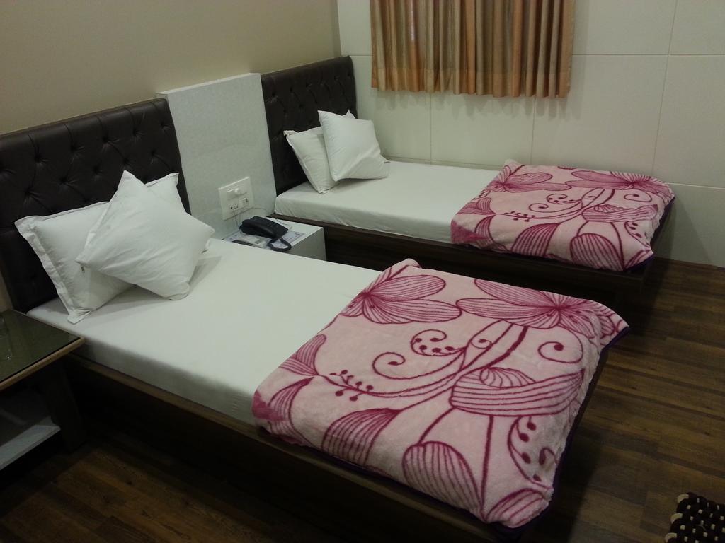 Hotel Oasis Bombaim Quarto foto